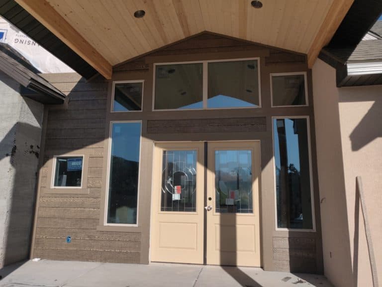Cabin entrance siding and soffit