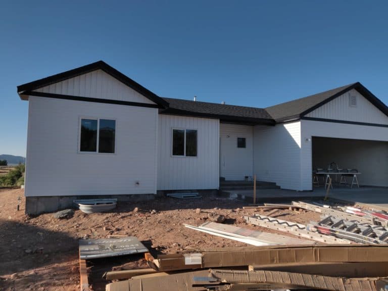Detailed view of clean white siding on modern house