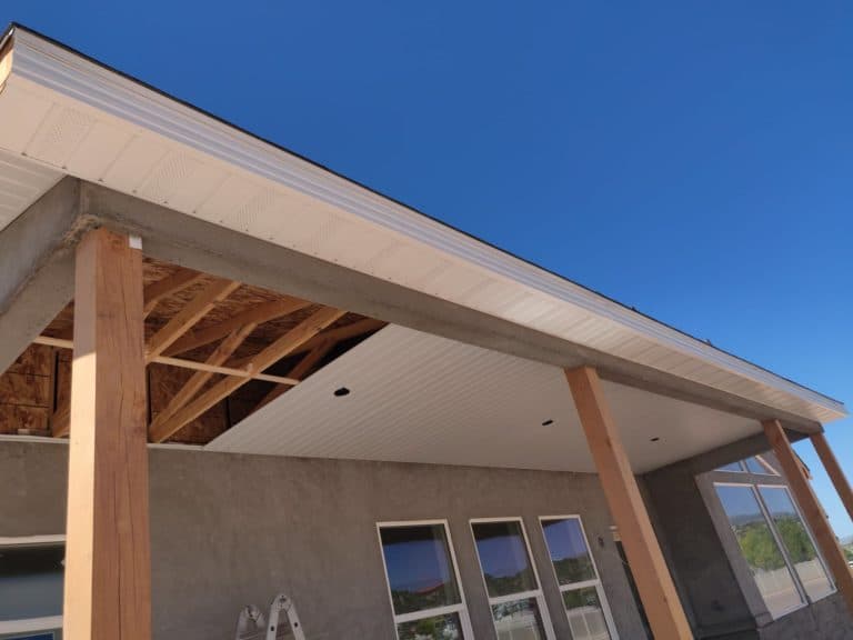Close-up of soffit installation under roof eaves