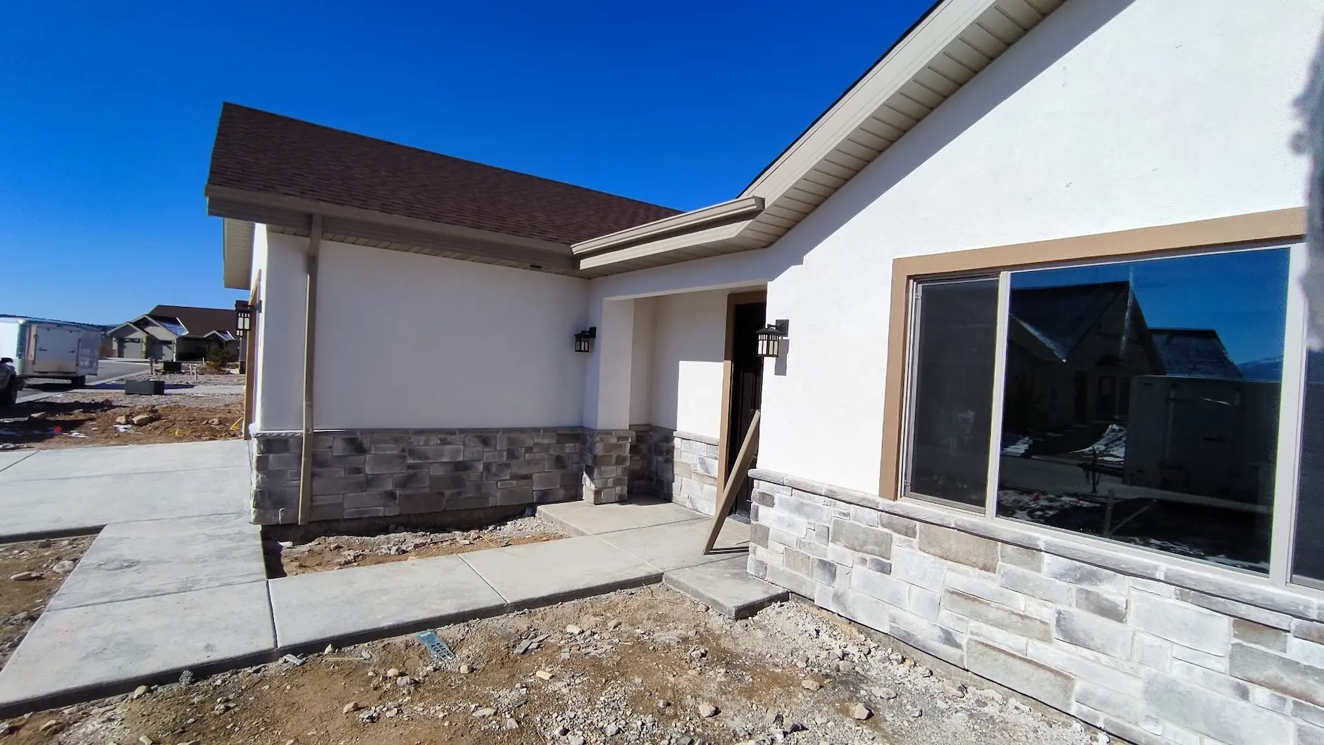 Stucco exterior finished by Zenic Industries on a St. George home